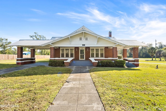 view of front of house with a front lawn