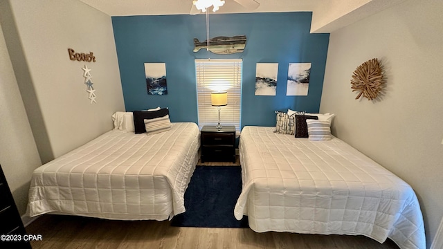 bedroom featuring dark wood-type flooring