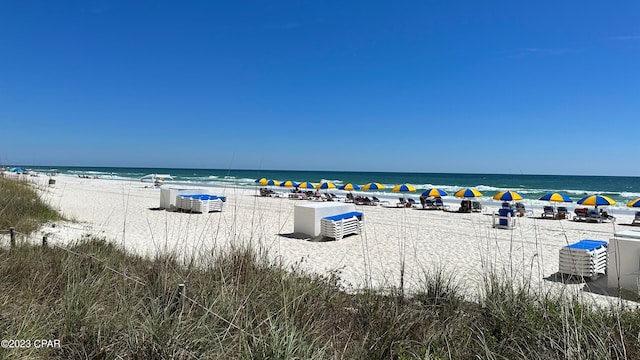 view of water feature with a beach view