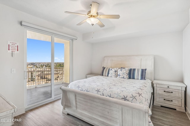 bedroom with access to exterior, ceiling fan, and light hardwood / wood-style flooring