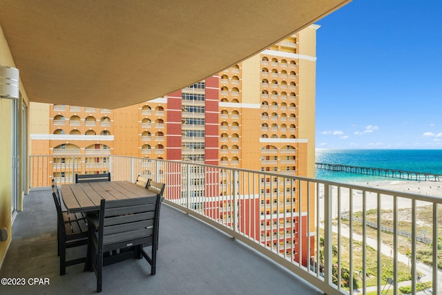 balcony featuring a water view