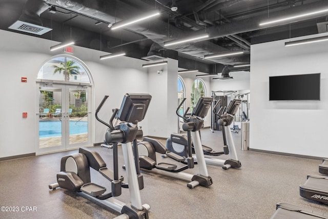 workout area featuring french doors