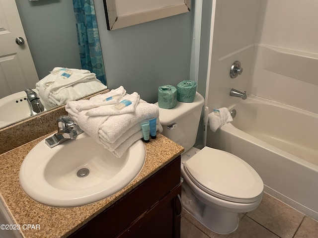 full bathroom with shower / tub combo, tile patterned floors, vanity, and toilet