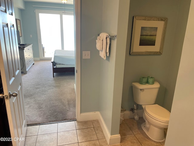 bathroom featuring toilet and tile patterned floors