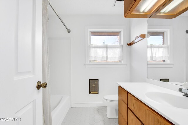 full bathroom featuring tile patterned flooring, vanity, washtub / shower combination, and toilet