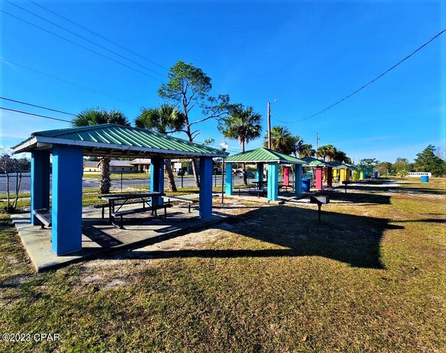 view of community featuring a gazebo and a lawn