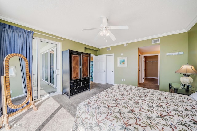 bedroom with carpet, a closet, ceiling fan, access to outside, and ornamental molding