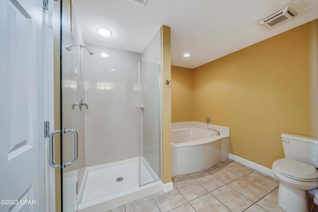 bathroom with shower with separate bathtub, tile patterned flooring, and toilet