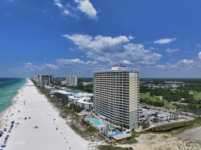 aerial view with a view of the beach and a water view