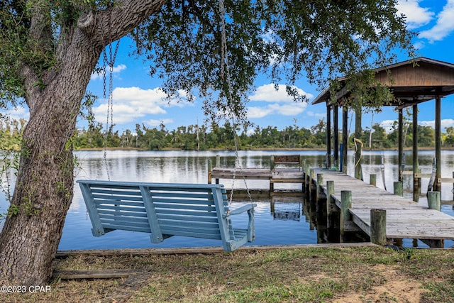 view of dock with a water view