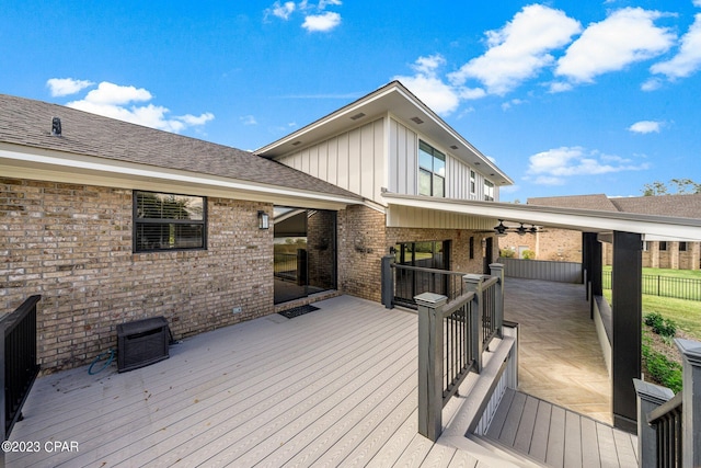 wooden deck with ceiling fan