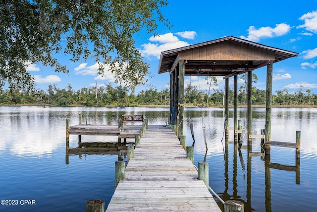 view of dock with a water view