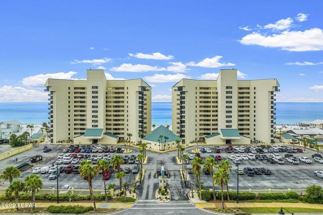 view of building exterior with a water view