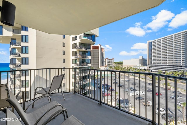 balcony featuring a city view