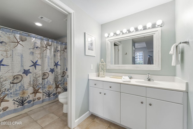 bathroom with walk in shower, tile patterned flooring, vanity, and toilet