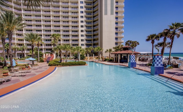 view of swimming pool featuring a gazebo