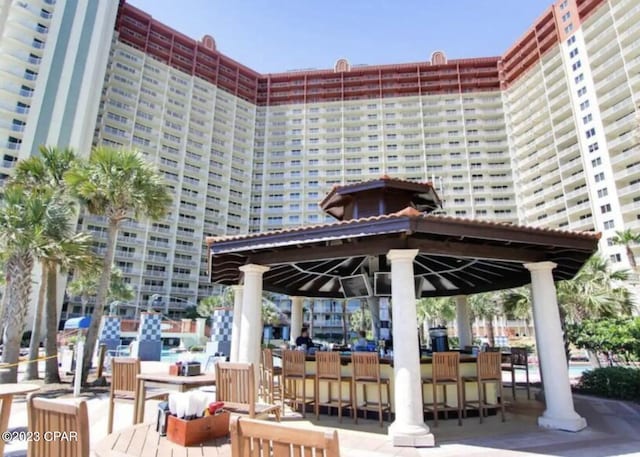 view of property's community with an outdoor bar