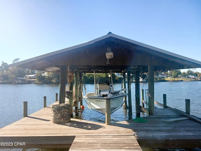 view of dock with a water view