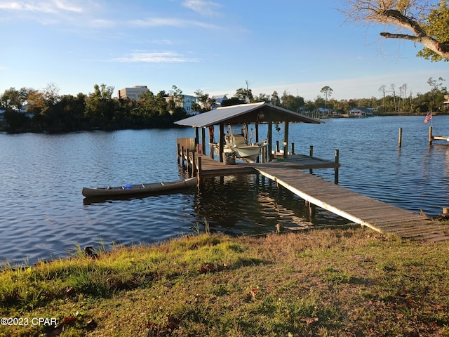 view of dock with a water view