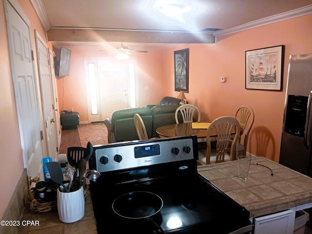 interior space featuring ceiling fan and ornamental molding