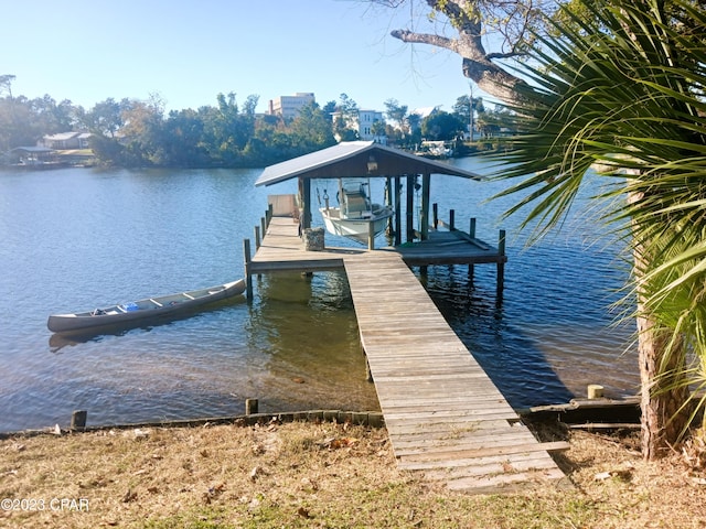 view of dock with a water view