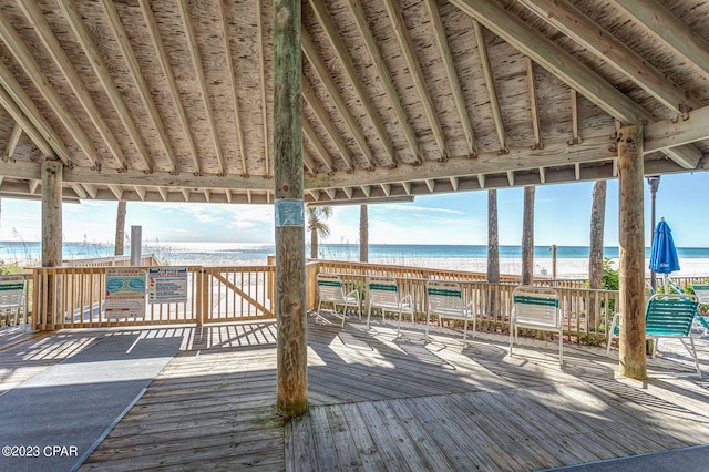 wooden deck with a water view