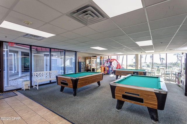 playroom with floor to ceiling windows, light carpet, a paneled ceiling, and billiards