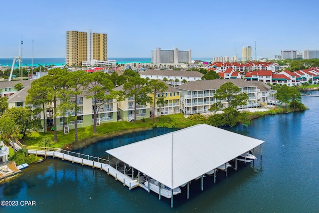 birds eye view of property featuring a water view