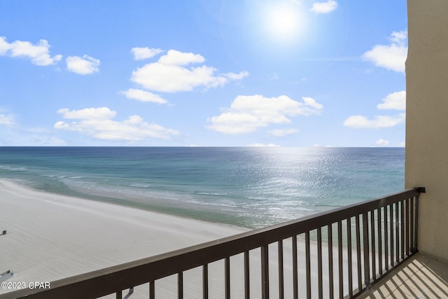 property view of water featuring a beach view