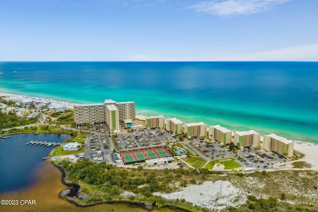 birds eye view of property featuring a water view and a view of the beach