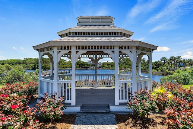 view of home's community featuring a gazebo and a water view