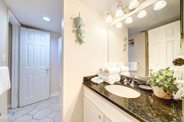 bathroom with vanity, tile patterned floors, and walk in shower