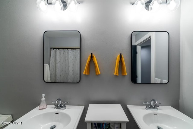 full bathroom with toilet and a sink