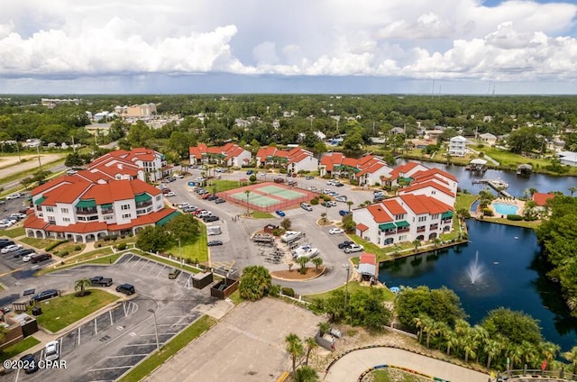 aerial view featuring a water view and a residential view