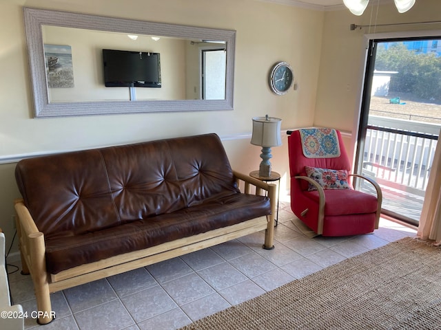 tiled living room featuring crown molding