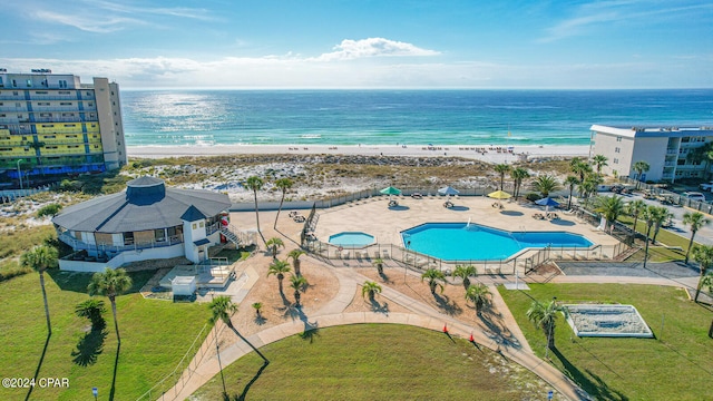 aerial view with a beach view and a water view