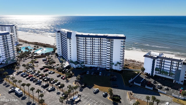 drone / aerial view with a view of the beach and a water view