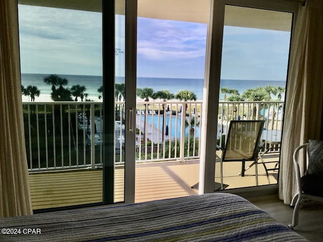 balcony featuring a water view