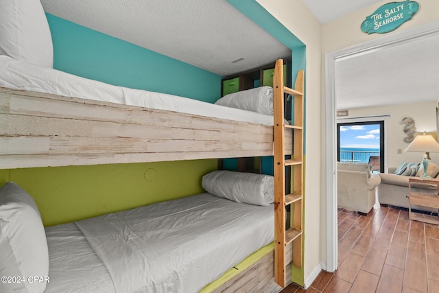 bedroom featuring wood-type flooring