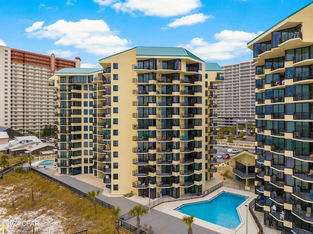 view of property with a community pool