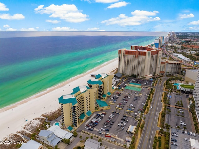 bird's eye view with a water view and a view of the beach