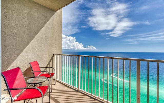 balcony featuring a water view