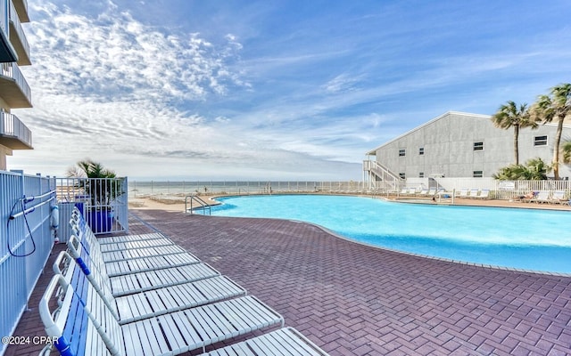 view of pool with a patio