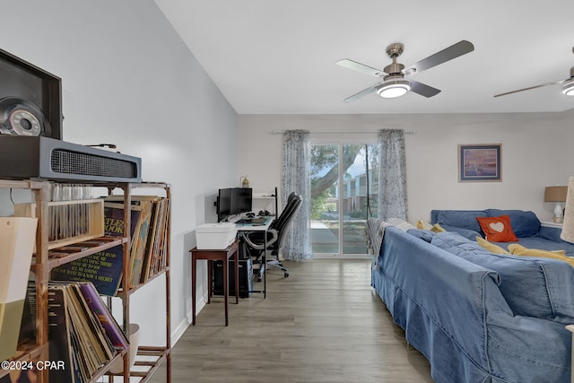 bedroom featuring access to exterior, ceiling fan, and light wood-type flooring