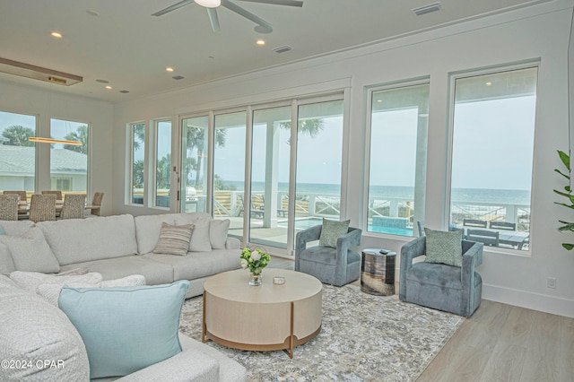 sunroom / solarium with ceiling fan