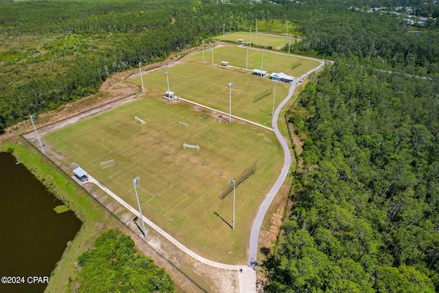 birds eye view of property featuring a rural view and a water view