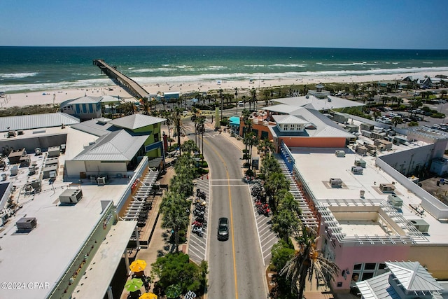 drone / aerial view featuring a view of the beach and a water view