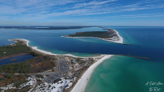 bird's eye view with a beach view and a water view