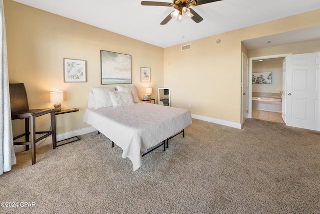 carpeted bedroom featuring baseboards, visible vents, and ceiling fan