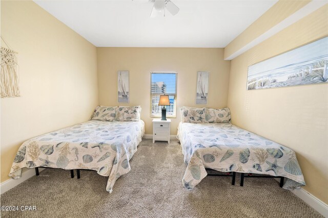 bedroom with light colored carpet and ceiling fan